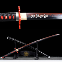 Black katana with red accents and flame designs rests on a stand, showcasing detailed handle wrap and engraved blade. Tanjiro V2 Katana.