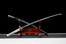 Kinbana no Yaiba Katana - — Manganese Steel, White wrapped handle, gold fittings, black textured saya, blue cord.