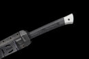 Iron Reaper Tactical Dao — high-carbon steel, Black textured handle, black ribbed polymer sheath with clip.