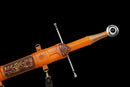 Aurantia Longsword — Spring Steel, Orange leather grip, silver steel guard/pommel, tooled orange leather scabbard.